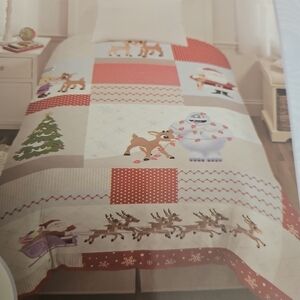 Holiday Quilt with Reindeer and Santa Design
